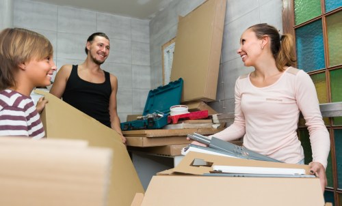 Local removals service preparing items for transport from a flat