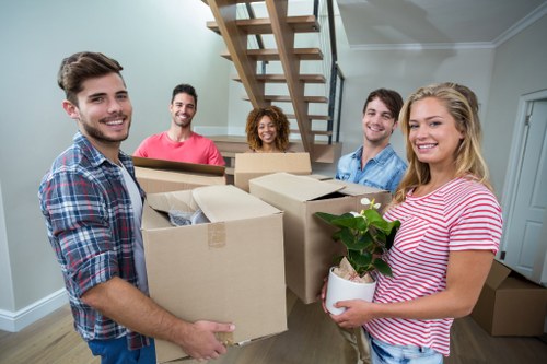 Careful wrapping and loading of household furniture for transport