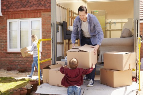 Local moving truck loading furniture in Bickley
