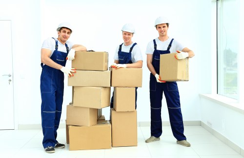 Removalists loading household furniture in a Bickley hillside home