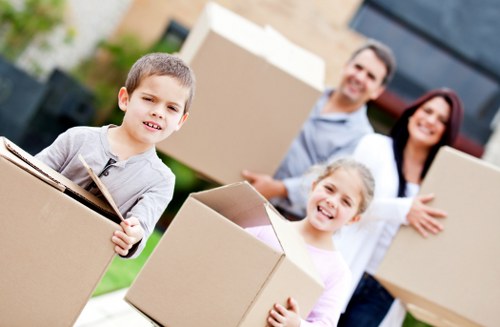 Professional movers handling furniture during a Bickley home removal