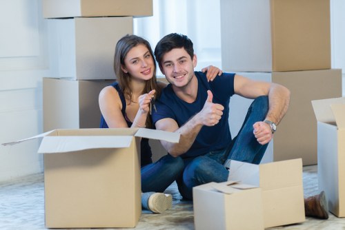 Preparing boxes and furniture for a moving truck in Bickley