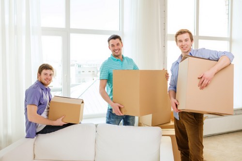 Packed office boxes and furniture ready for a commercial move in Bickley